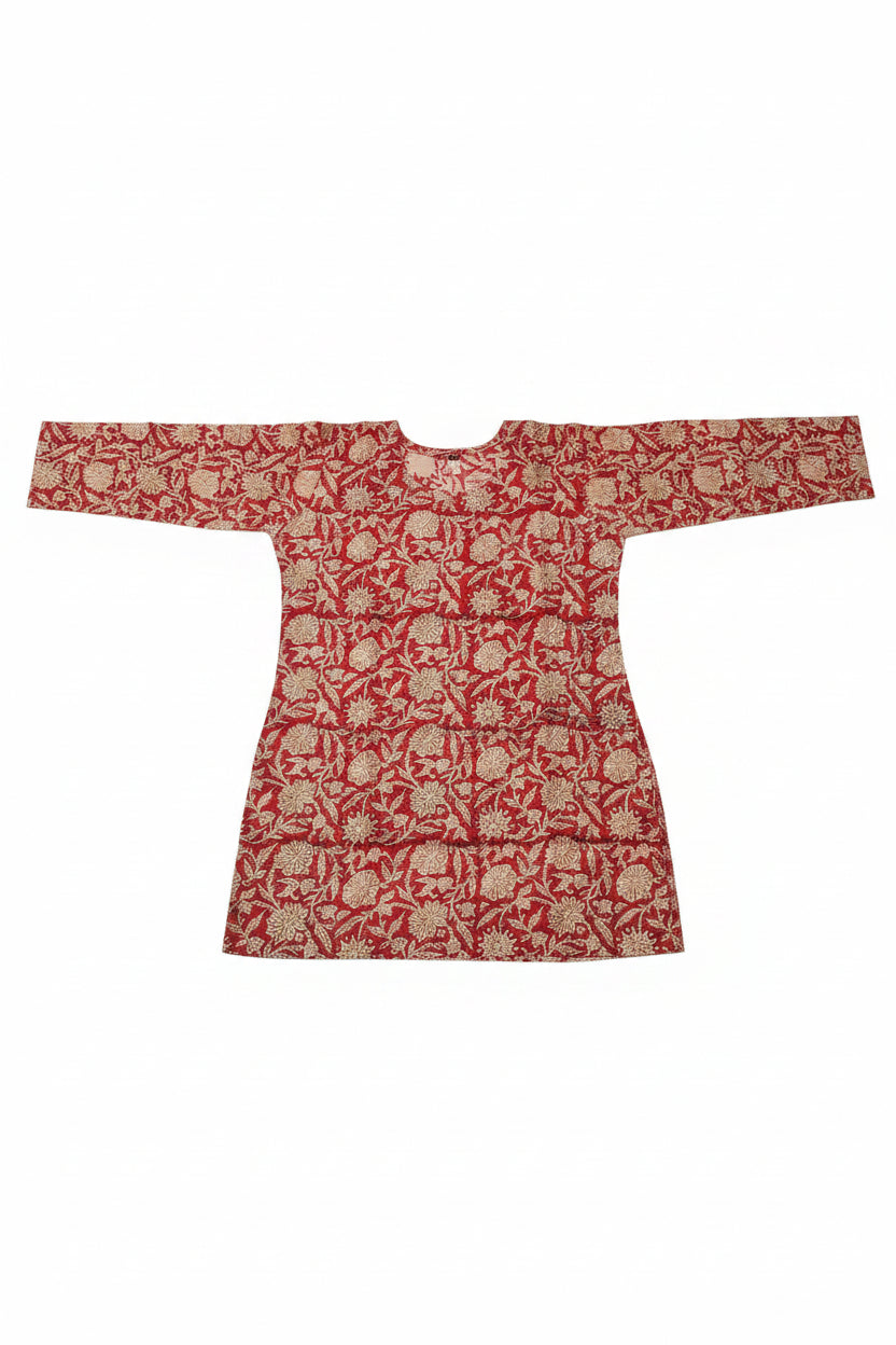 A long-sleeved tunic with a red and white floral block-print pattern.
