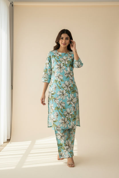 A light blue two-piece coord set with a white and green floral print.