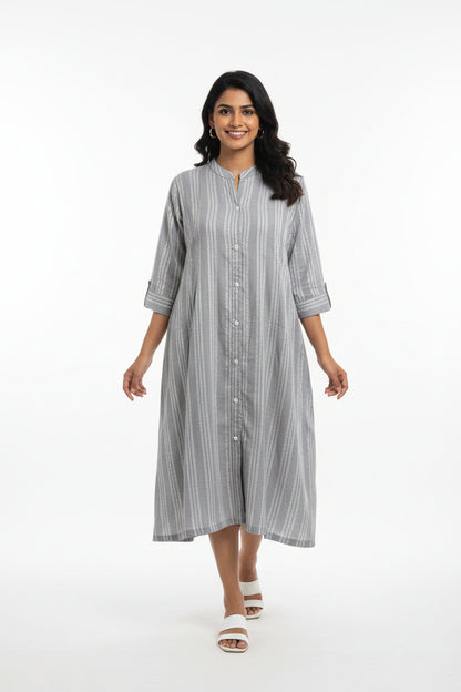 A light gray and white vertically striped long-sleeve tunic dress with a button-down front