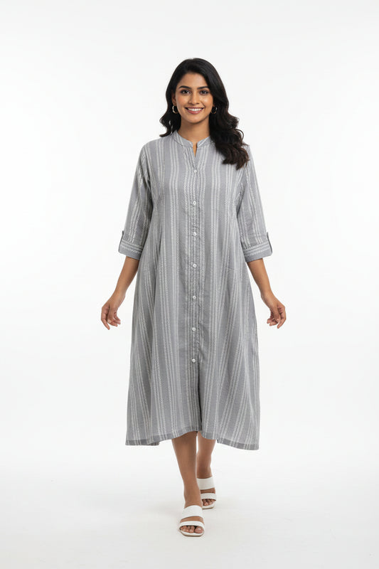 A light gray and white vertically striped long-sleeve tunic dress with a button-down front