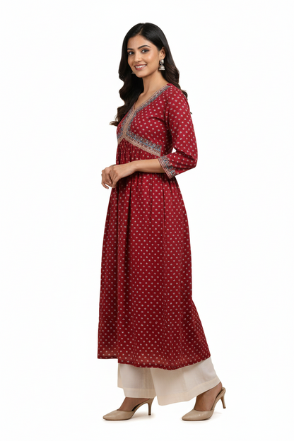 Kurti for Women - red three-quarter sleeve kurta with a white geometric pattern.